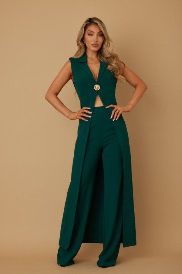 Woman wearing a green jumpsuit.